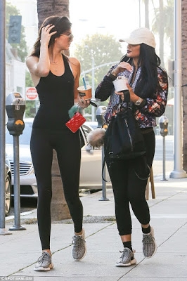 Kylie and Kendall Jenner wear tight yoga pants as they go shopping
